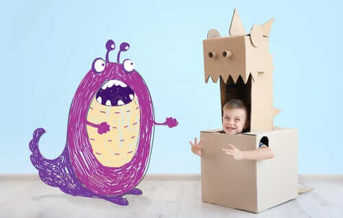 Un monstre et un enfant dans un carton