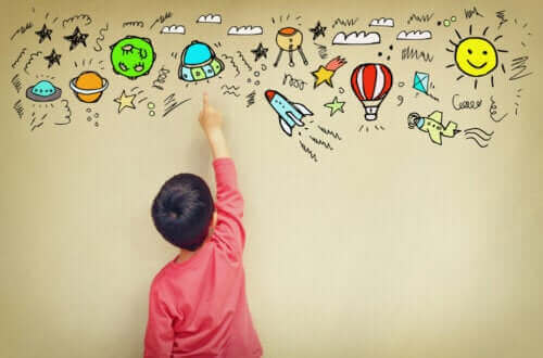 enfant dessinant des symboles