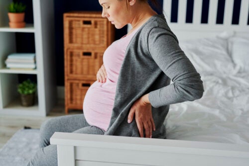 Sacro-iliite pendant la grossesse: symptômes et traitement